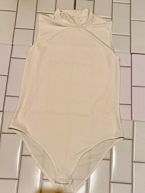 Sleeveless Mock Neck Bodysuit in Crisp White